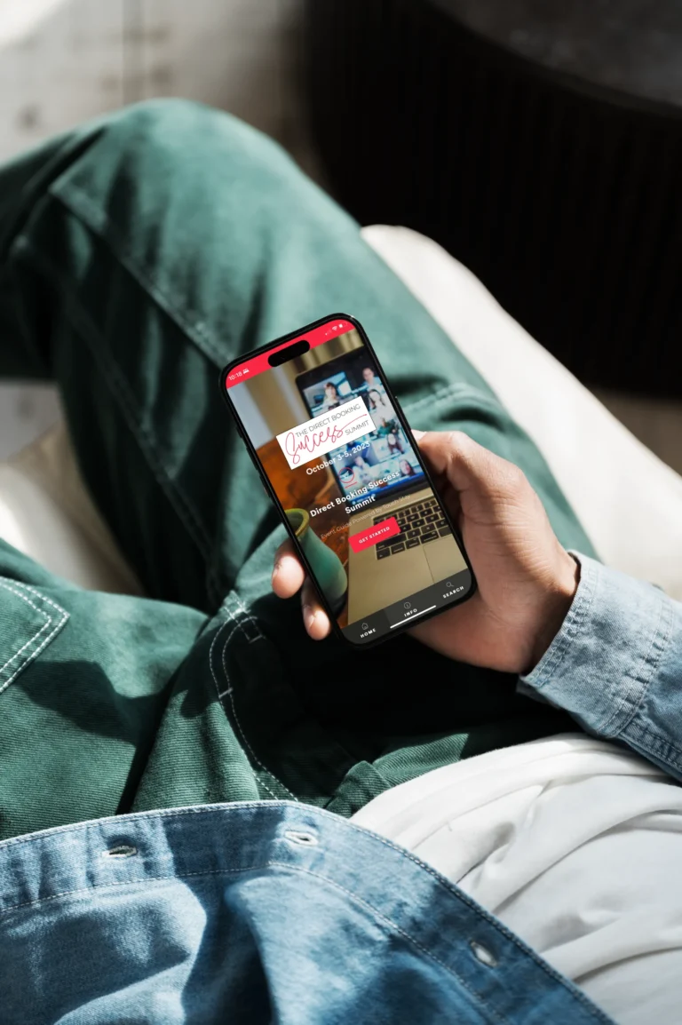 man holding iphone with splash scene of digital guidebook